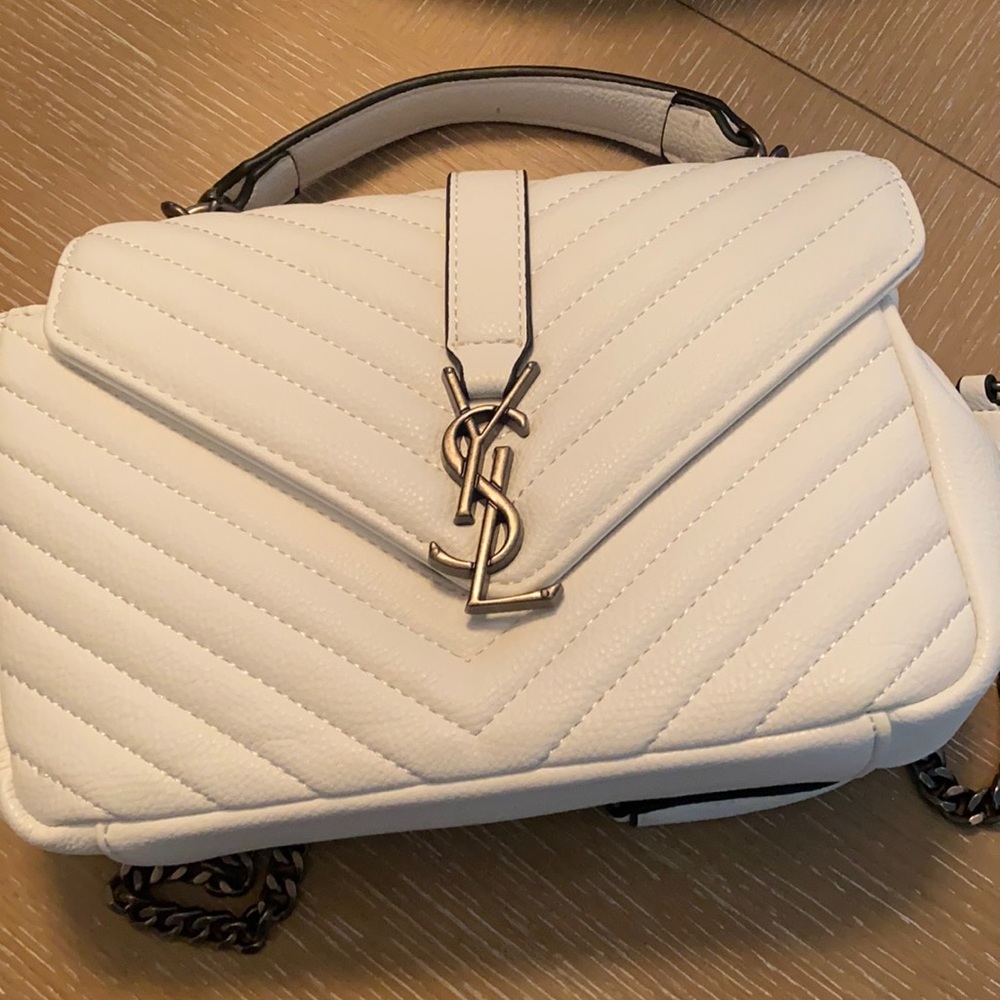 New white YSL. Comes in a dust bag. Never used.